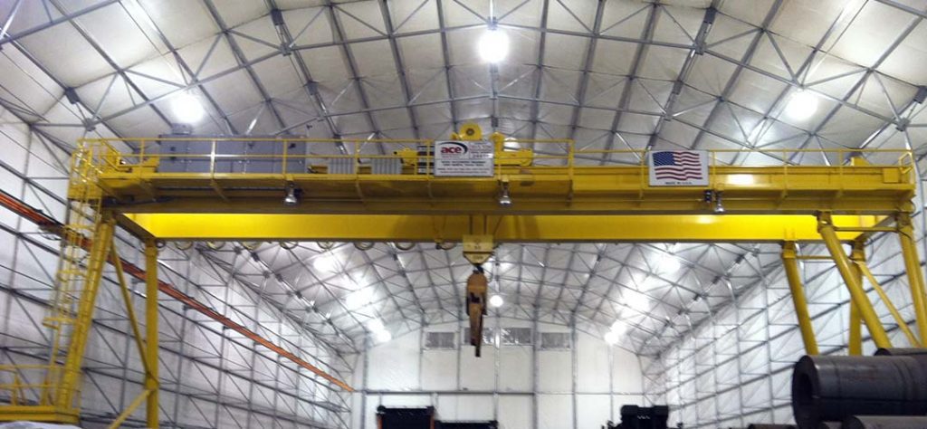 Gantry crane used in the railroad industry for lifting wire coils on and off of rail cars.