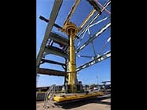 Stacker Crane with Platform.  Used for painting and repairing aricraft.